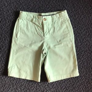 Boys green Tailorbyrd shorts.